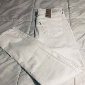 Levi’s 711 skinny white jeans size 12 length is 30